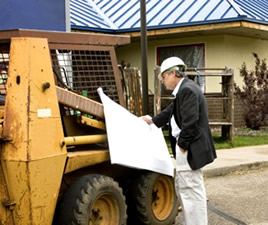 Engineer on commercial roofing jobsite